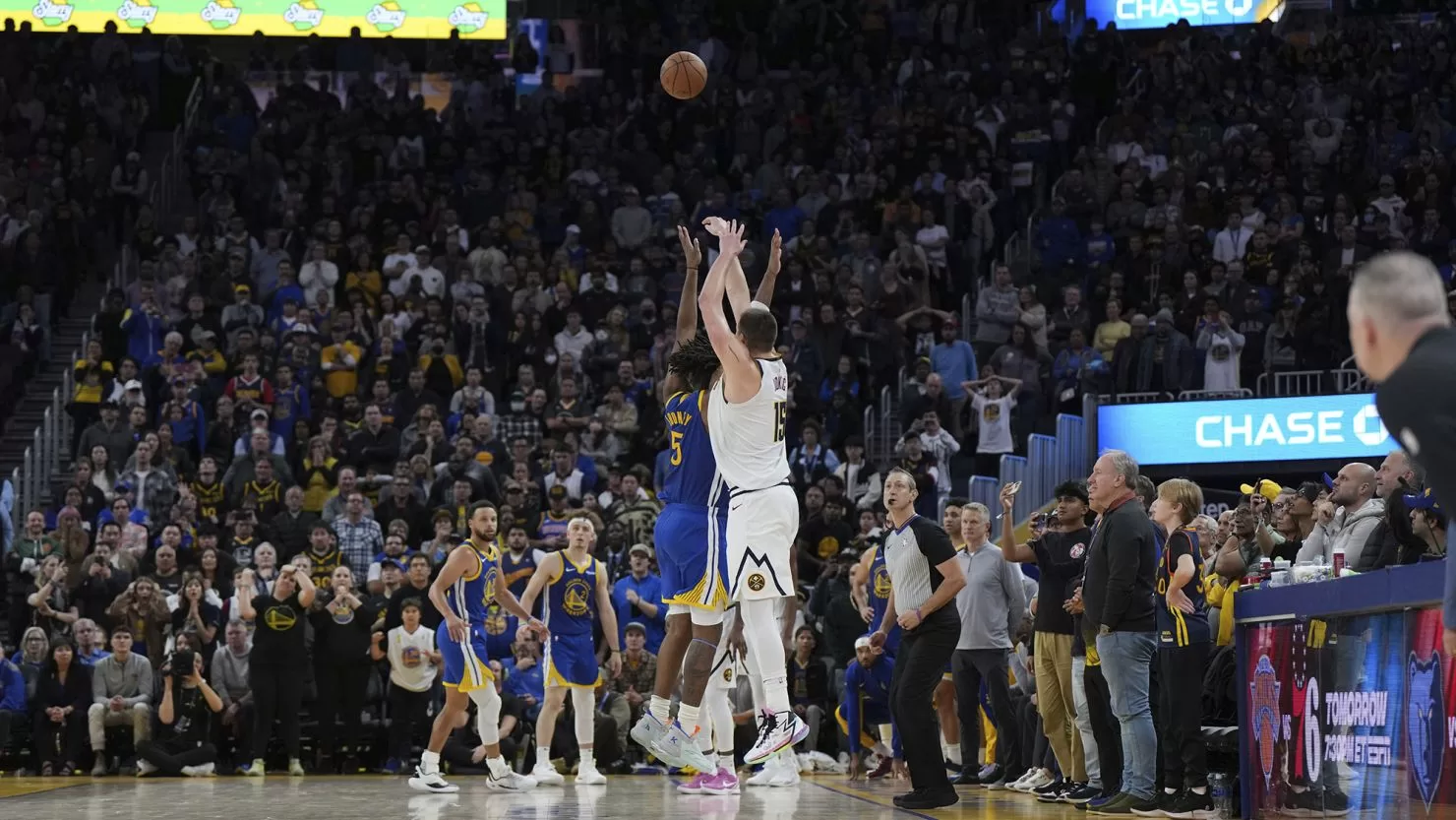 The game-winning shot was made by Nikola Jokic from almost half court